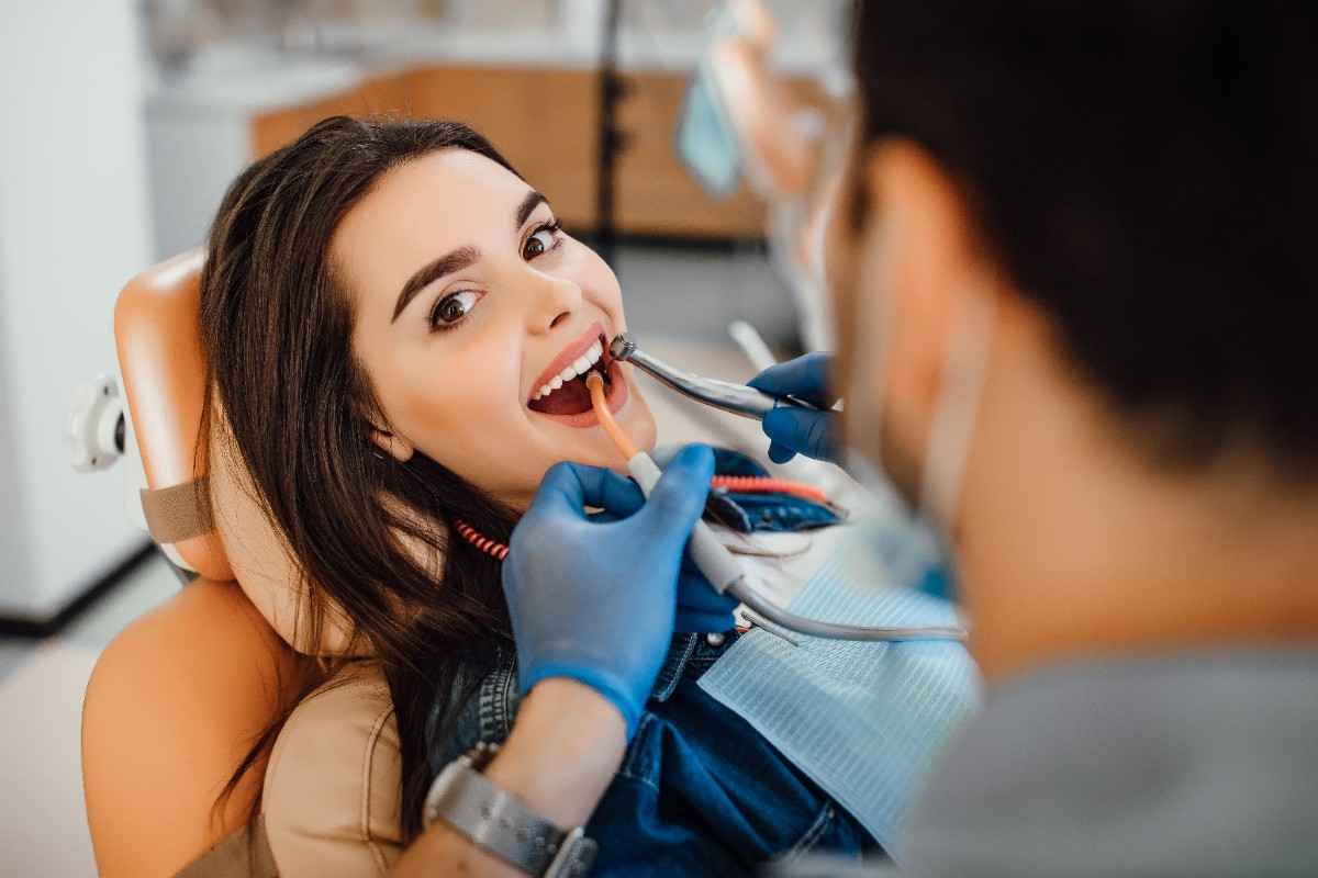 young female patient visiting dentist office 1